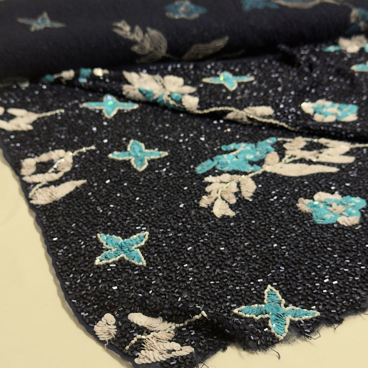Dark blue chiffon fabric embroidered with flowers, leaves and stars