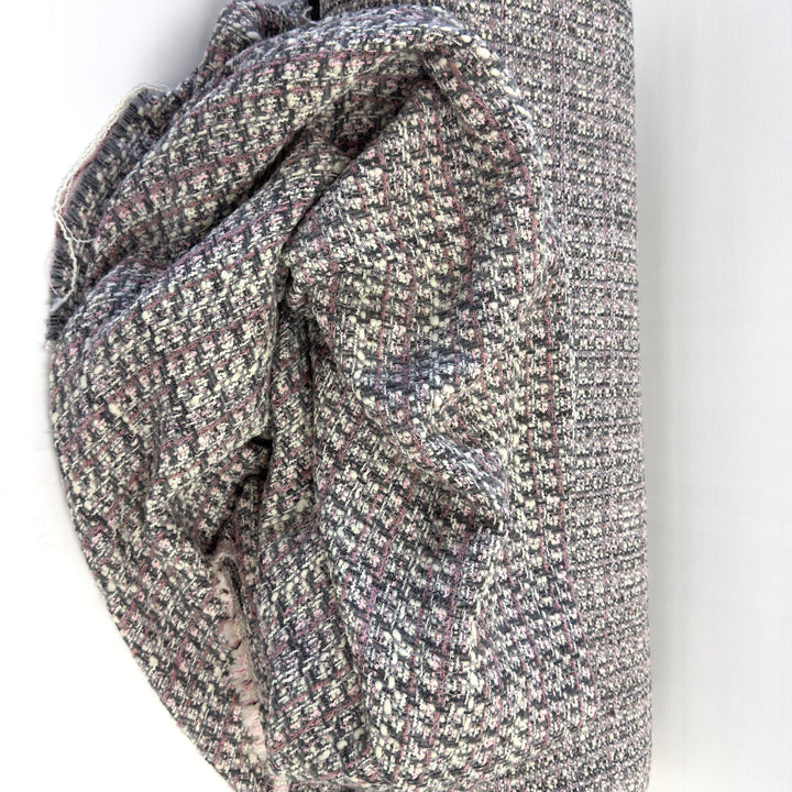 Pink and grey bouclé fabric, draped