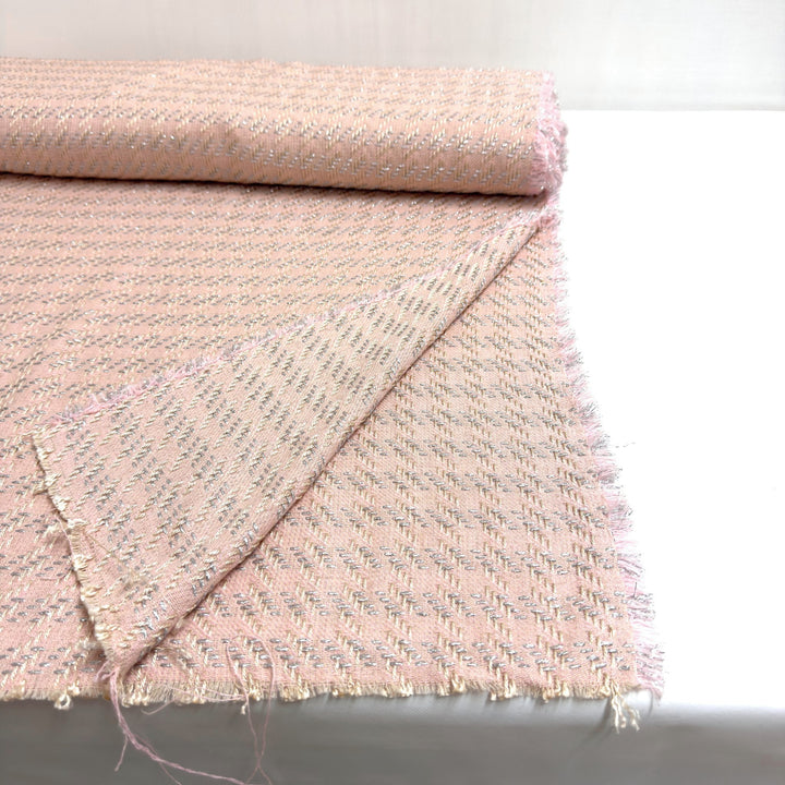 Pink fabric with silver threads, 160 cm wide: the roll and the fabric laid out