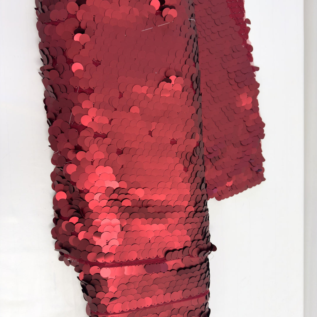 Red sequin fabric seen from above